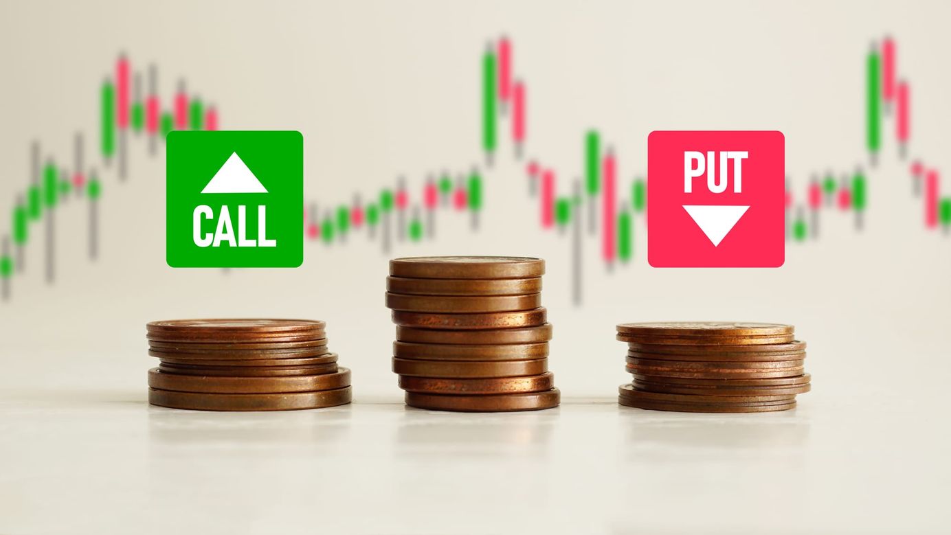Stacked coins with a stock chart background, showing a green 'Call' arrow up and a red 'Put' arrow down for options trading.