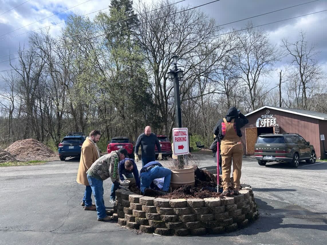 Volunteers rebuilding the stone planter at LIVE-IT Ministries