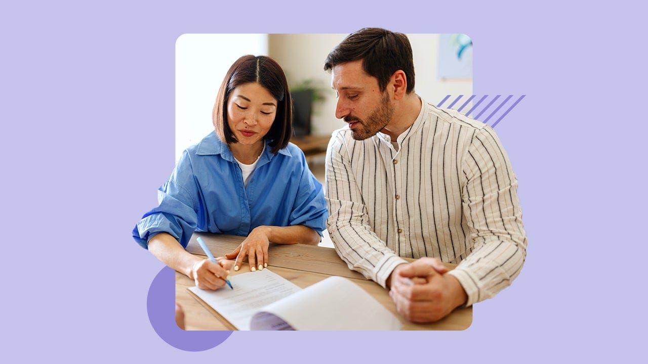 Homebuyer reviewing mortgage pre-approval documents at a desk