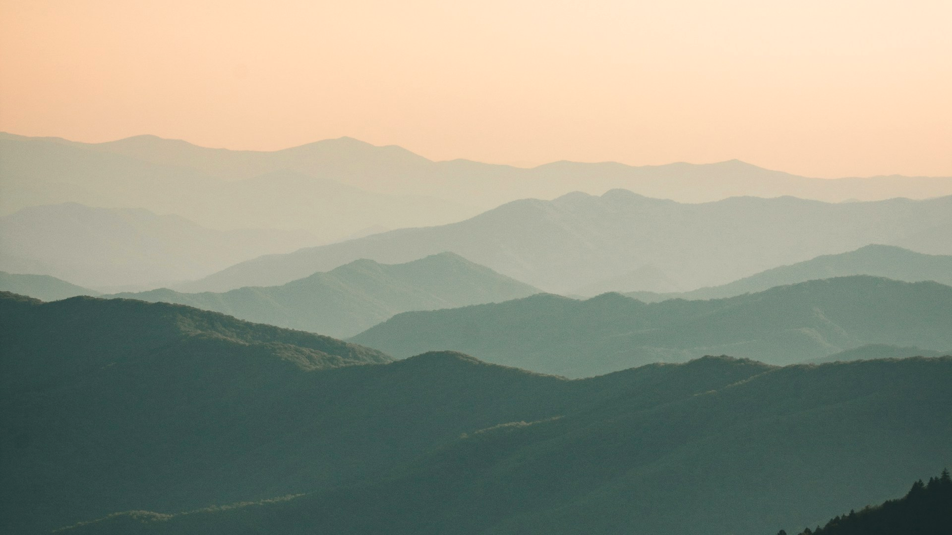 Photoreal layered Blue Ridge mountain ridges in soft evening haze in Northeast Tennessee, no people, logos, or text