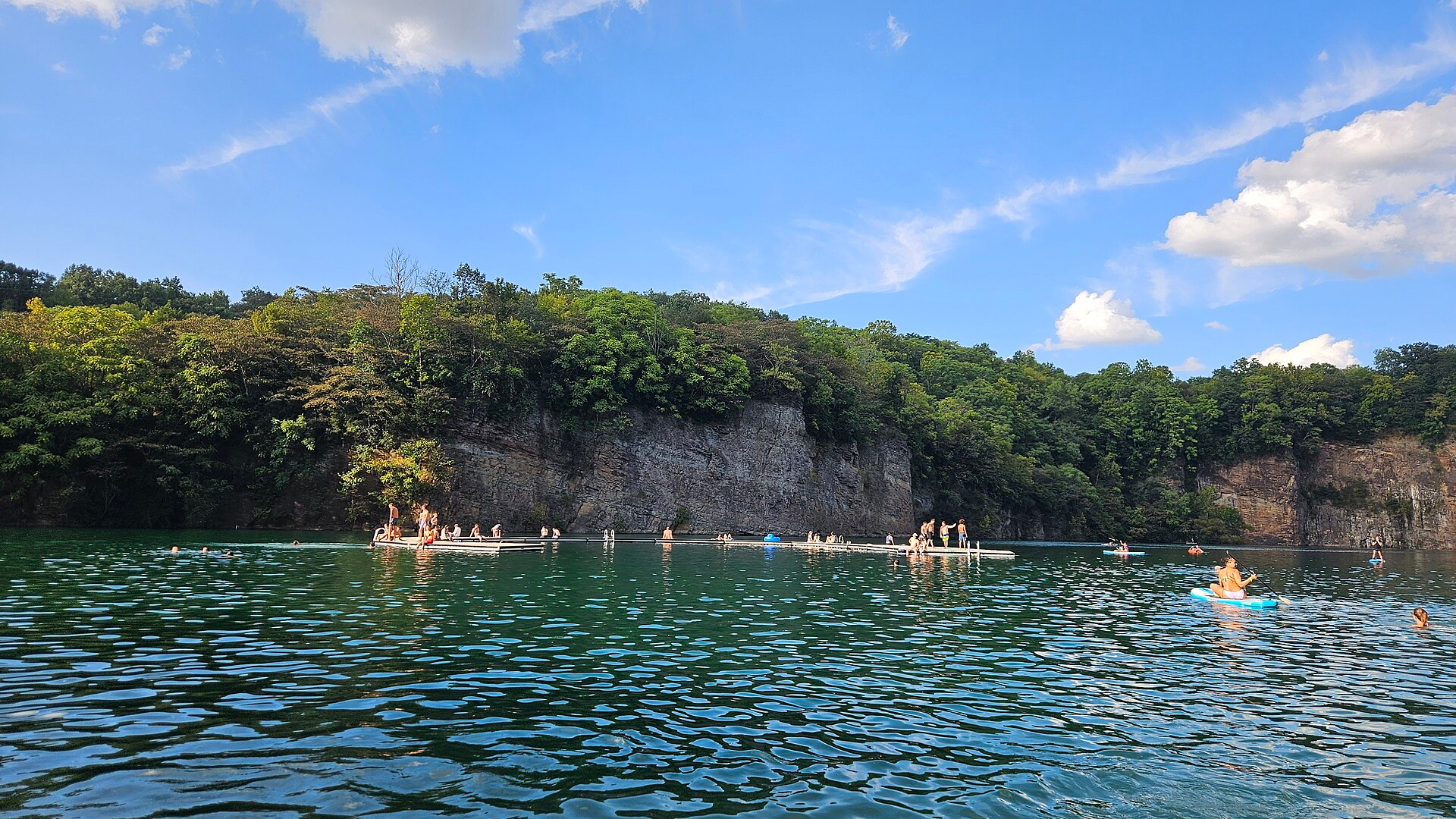 Swimmers and paddleboarders on Augusta Quarry at Fort Dickerson Park in Knoxville