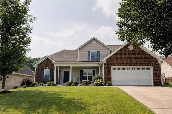 Well-kept Powell Tennessee suburban home with mature trees and seller-ready curb appeal