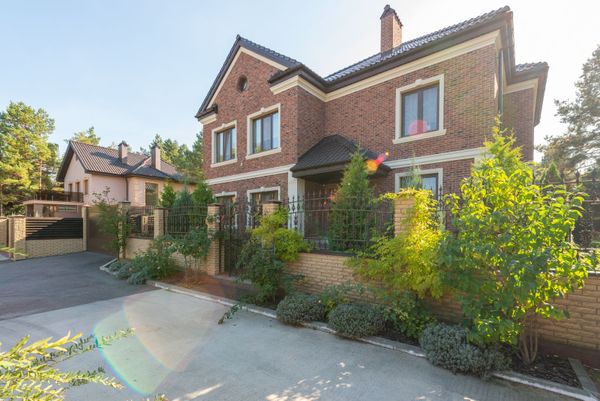 Photoreal Hixson suburban home with autumn light, no people, logos, or text