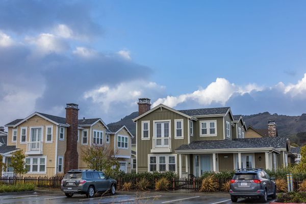Photoreal Knoxville suburban home exterior, soft daylight, no people, logos, or text