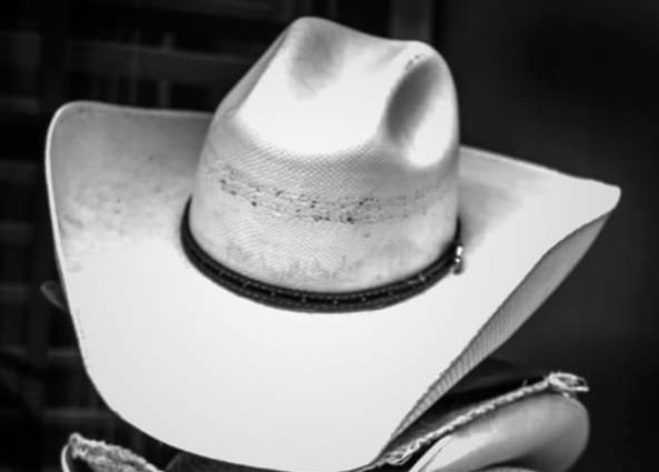 grayscale photography of a white cowboy hat