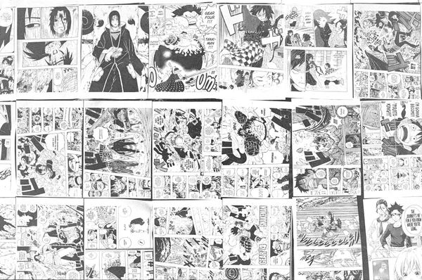 Black-and-white collage of comic book pages and panels arranged in overlapping rows, showing illustrated characters, speech bubbles, action scenes, and page layouts.