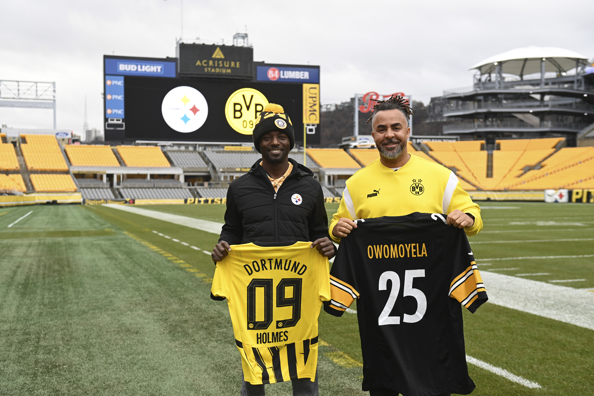 Santonio Holmes and Patrick Owomoyela