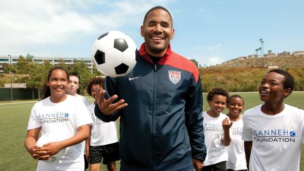 Tony Sanneh and kids from his foundation