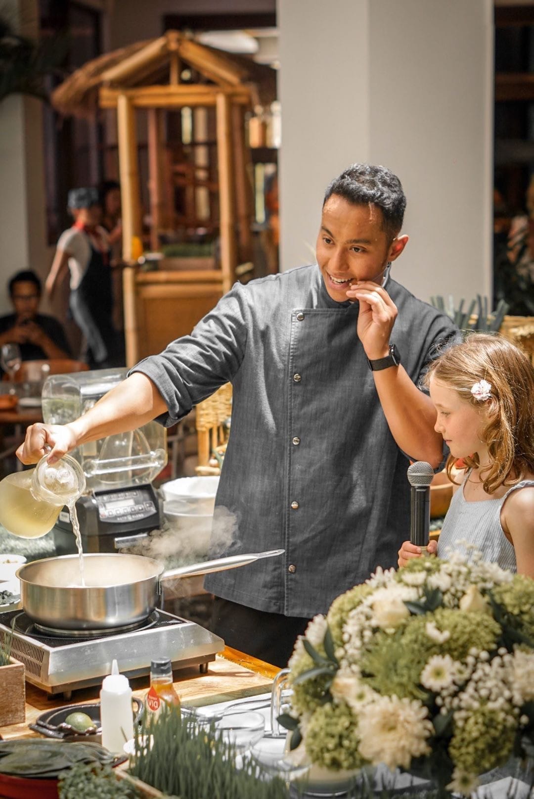 Chef Yuda Bustara cooking at a pop-up dining event