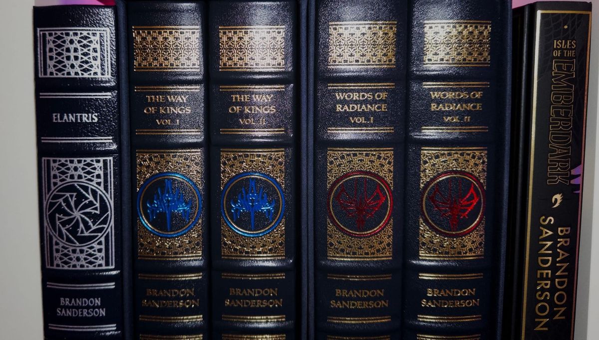 A shelf of Brandon Sanderson books.