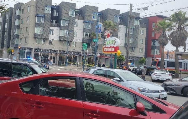 Cars and caution tape.