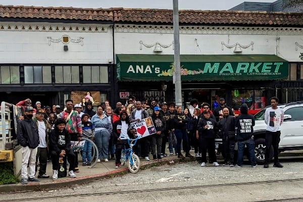 Crowd poses for photo.