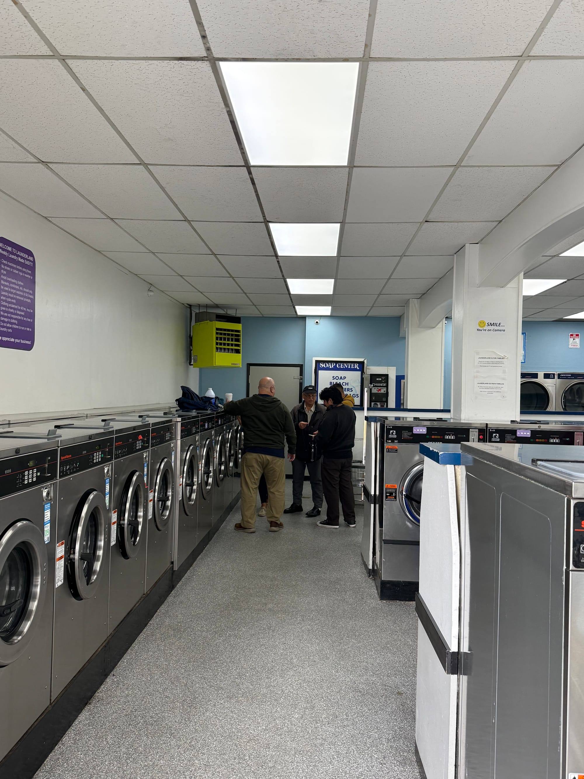 People in a laundromat.