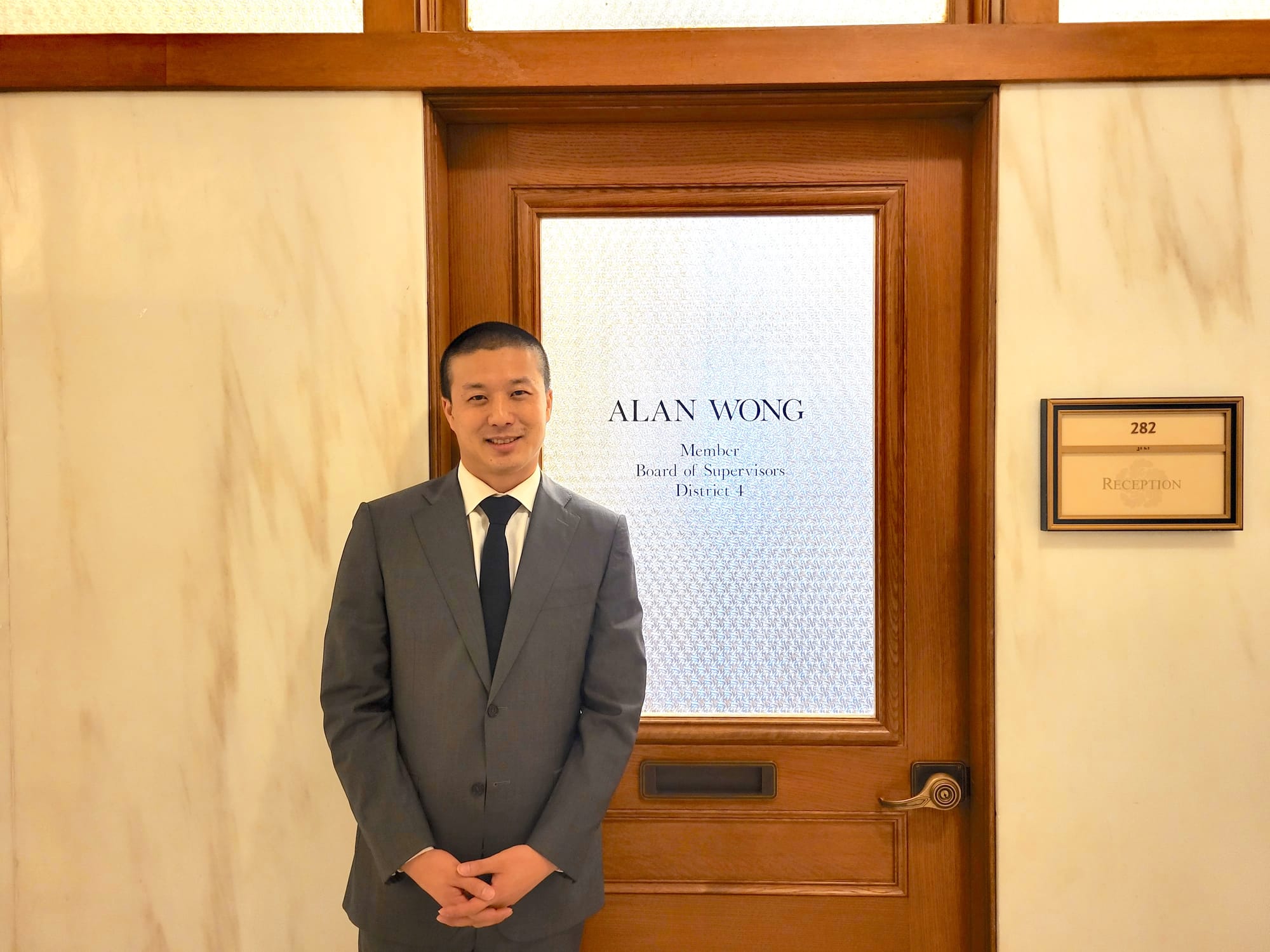 Man in front of door.