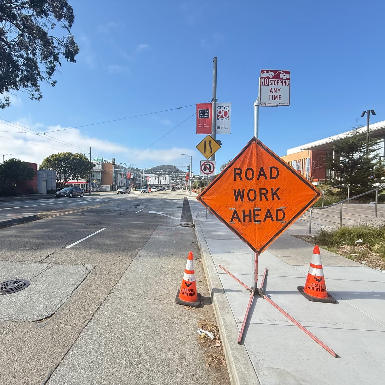 A sign that reads "Road Work Ahead."