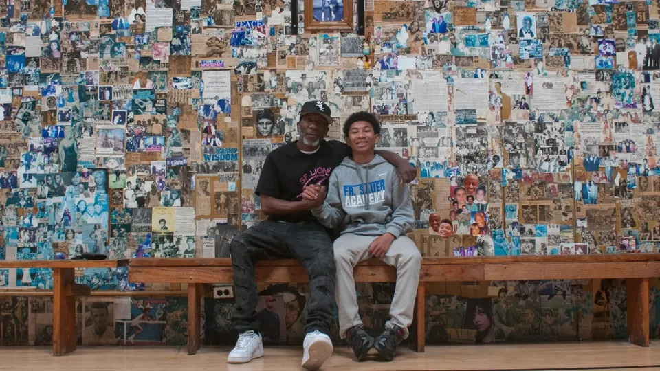 Two people pose for a photo.