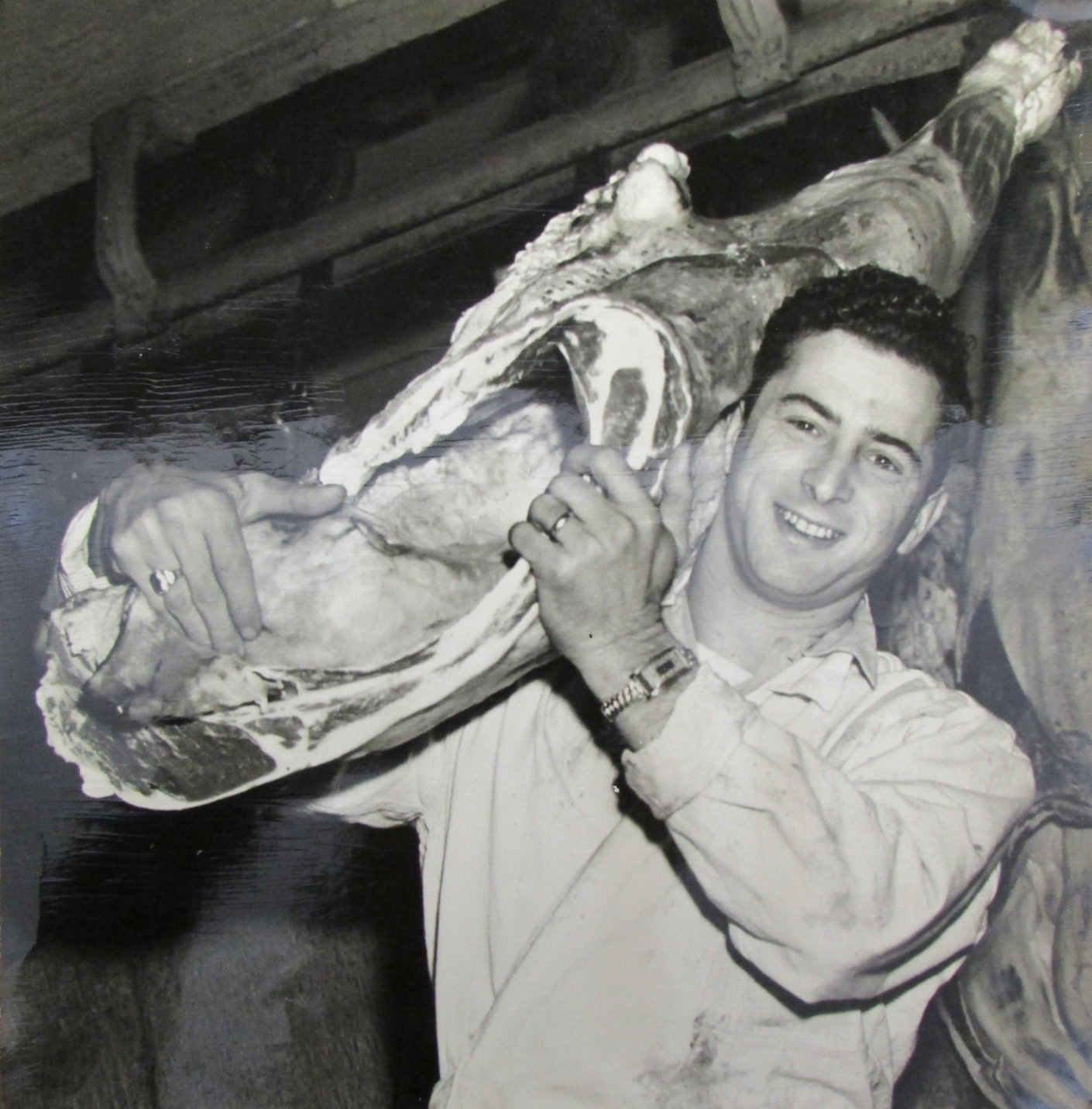 Man carrying beef.