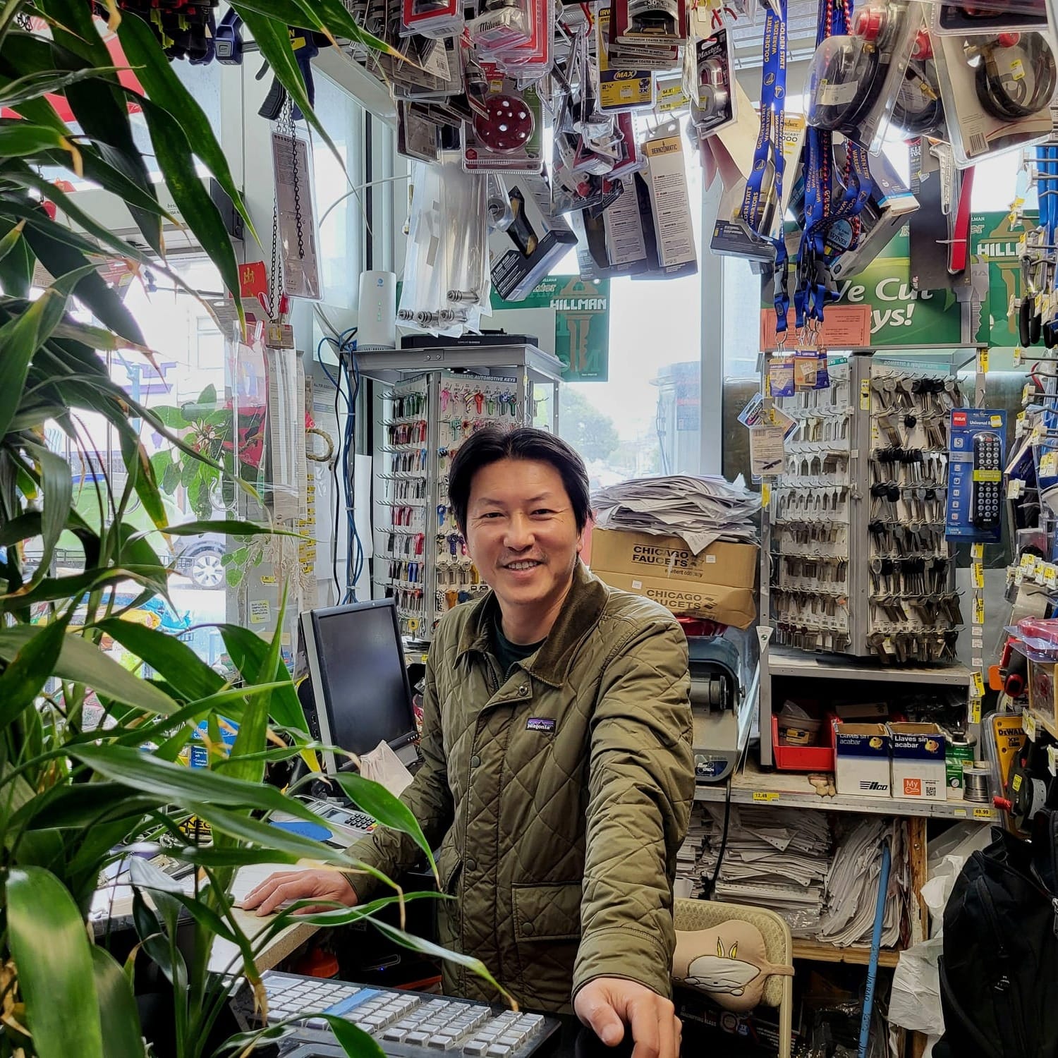 Man behind a cashier.
