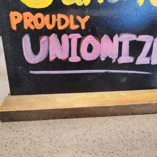 Sign that reads "proudly unionized."