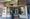 People walk in front of a storefront