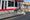 Person at boarding island as streetcar waits.