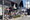 People at a storefront having a blast.