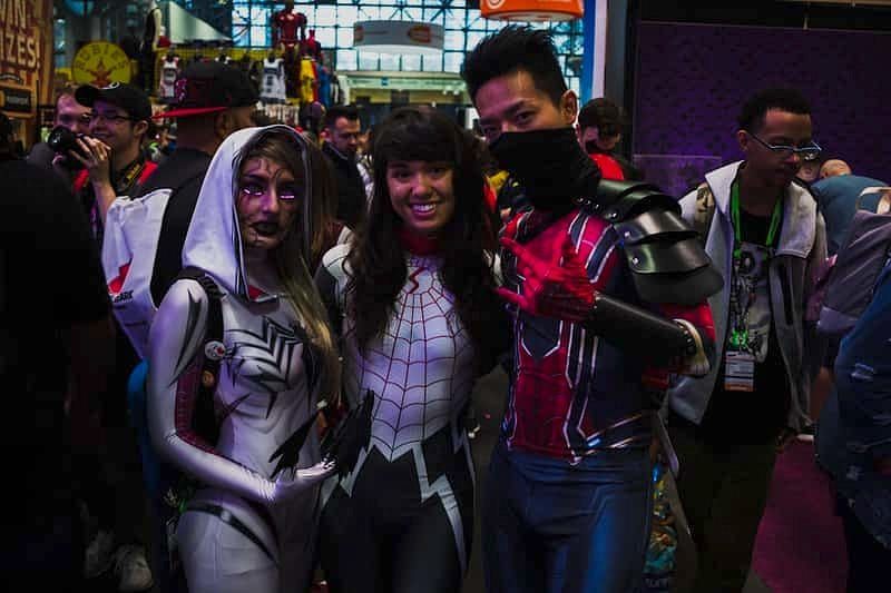 3 women standing beside each other