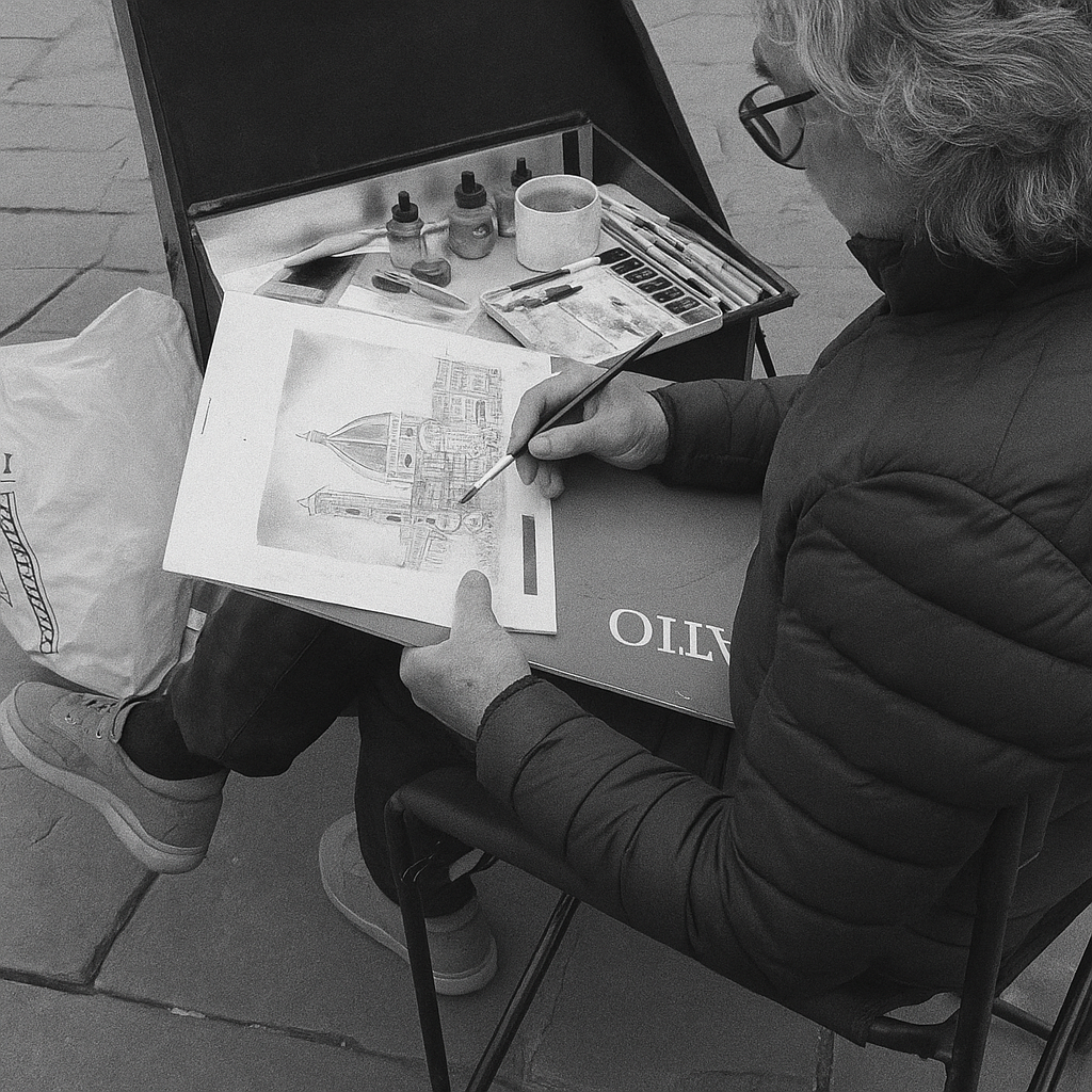 An artist paints a watercolor of a city.