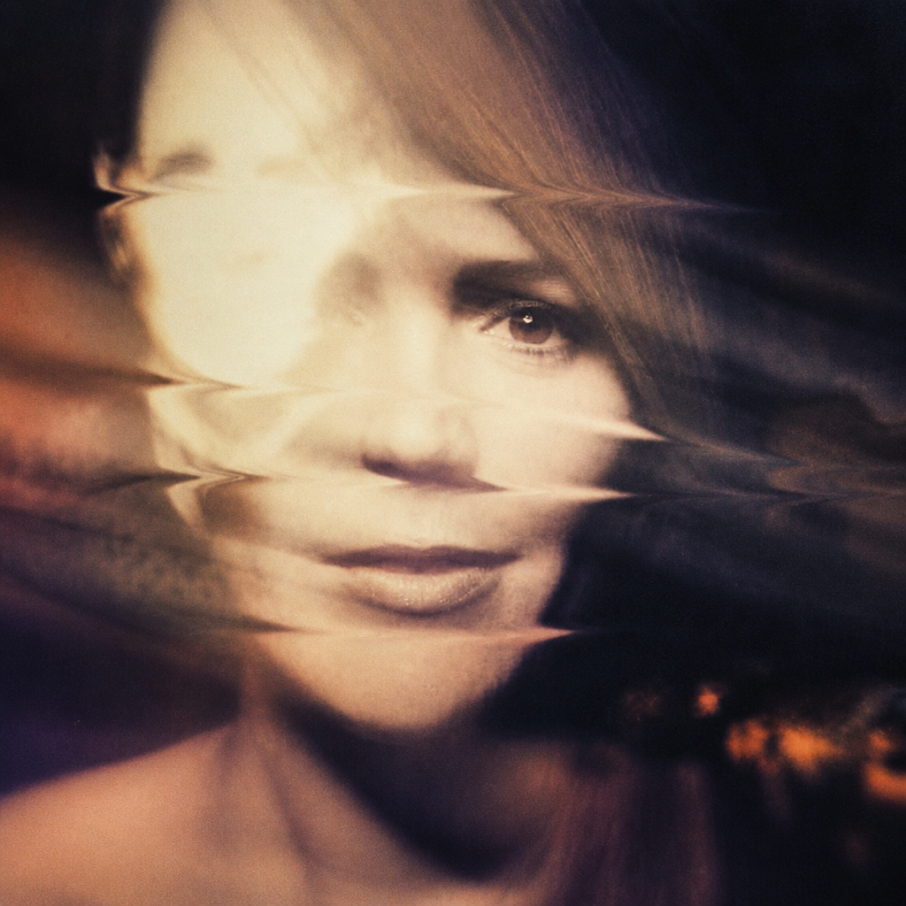 person's face hit by light, distorted