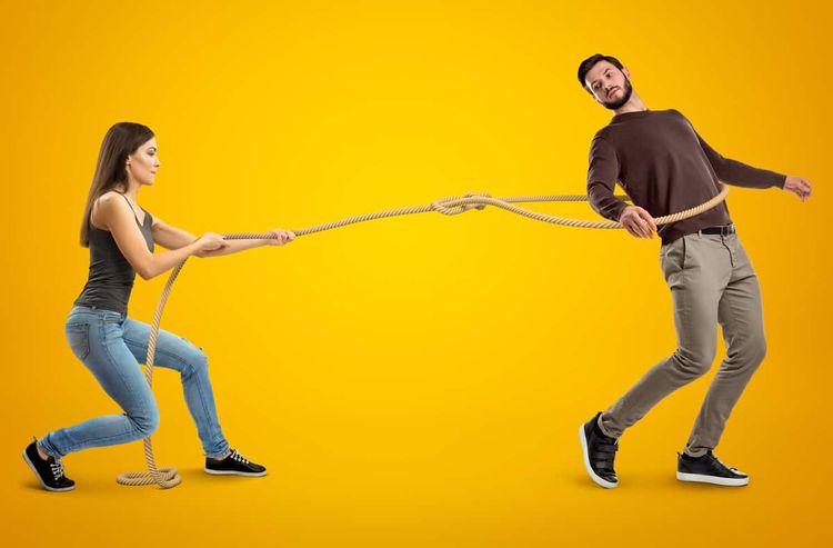 a woman roping a man