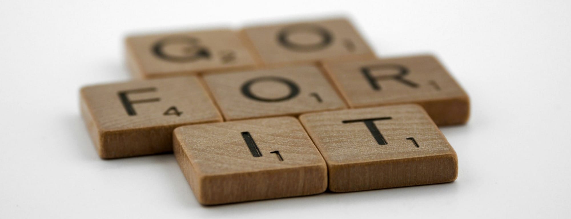 brown wooden number 8 on white surface