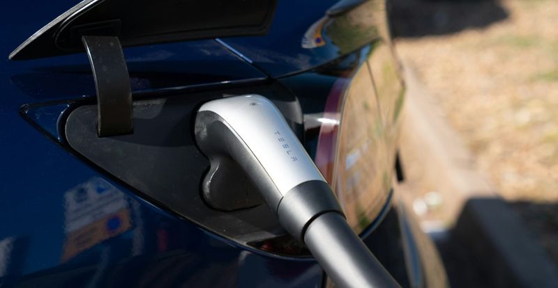 Model 3 Plugged into a Tesla supercharger