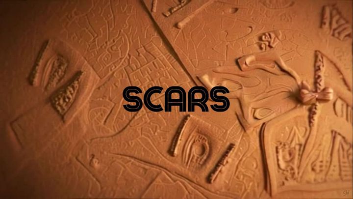 IMAGE OF THE SCARS VIDEO SHOWING LIKE A CLAY SCARRED BACKGROUND