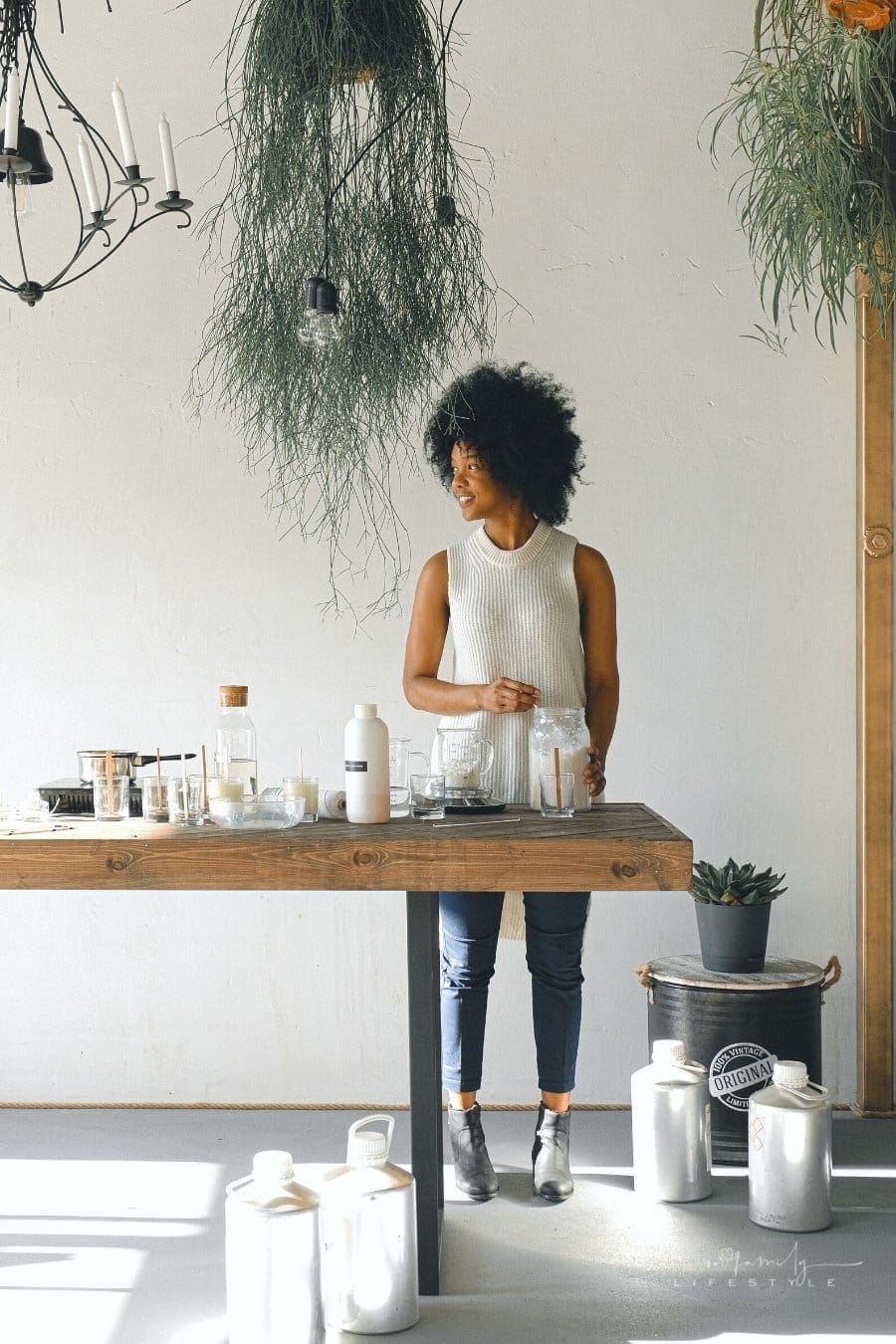 small business owner making candles