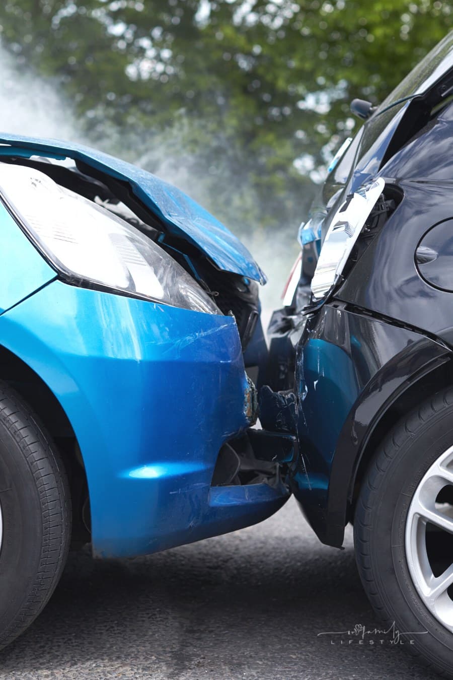 close up of two cars in rear end collision
