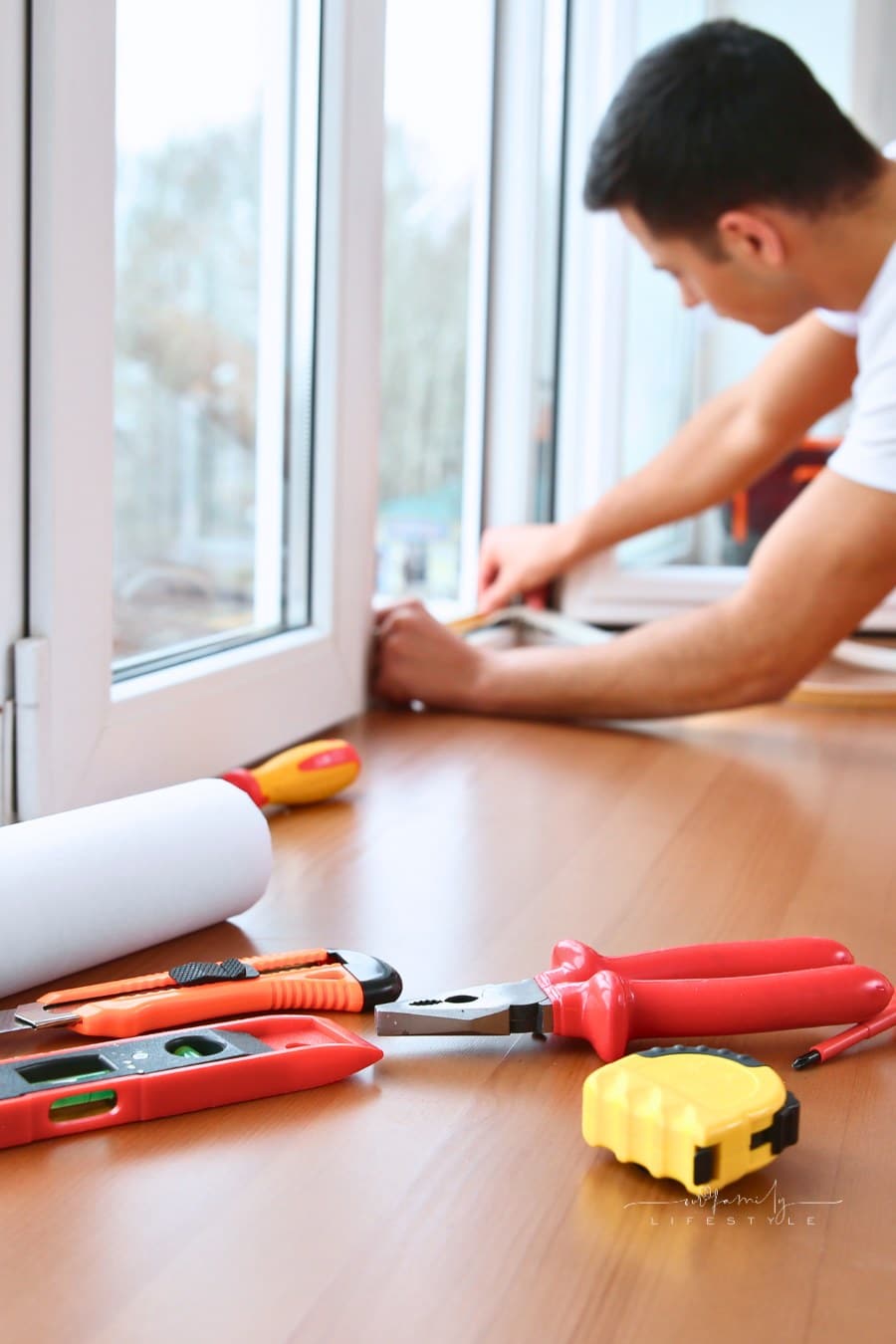 Worker Installing Window in Flat