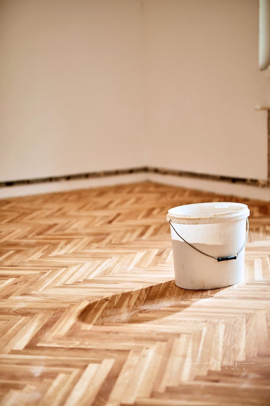 Restoring and cleaning old hardwood floor parquet.