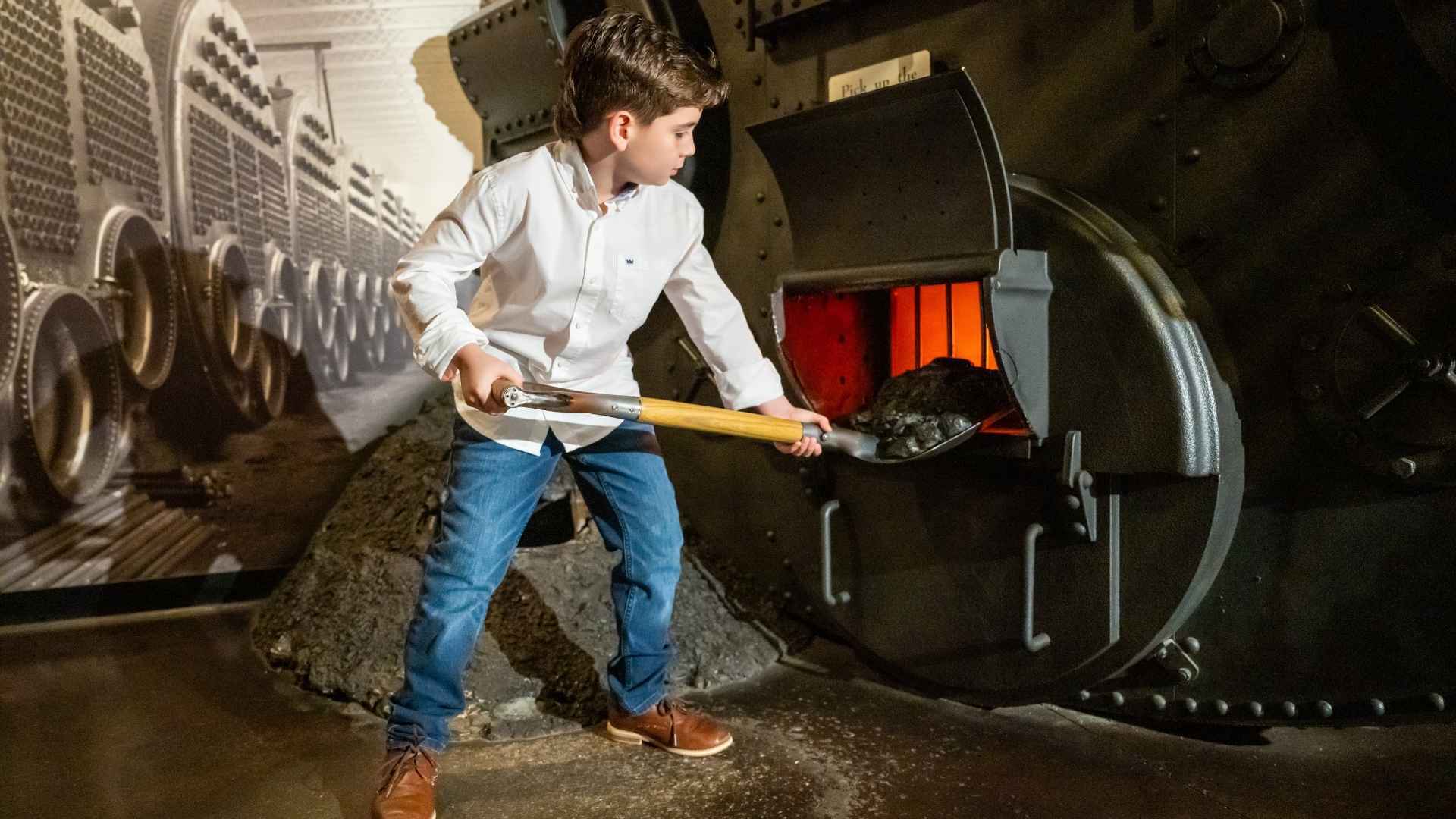 Experience a fireman's work: shoveling coal at the Titanic Museum.