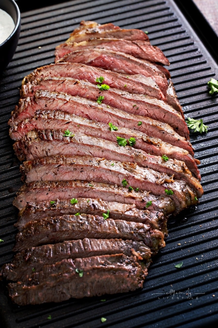 Grilled flank steak on a grill pan