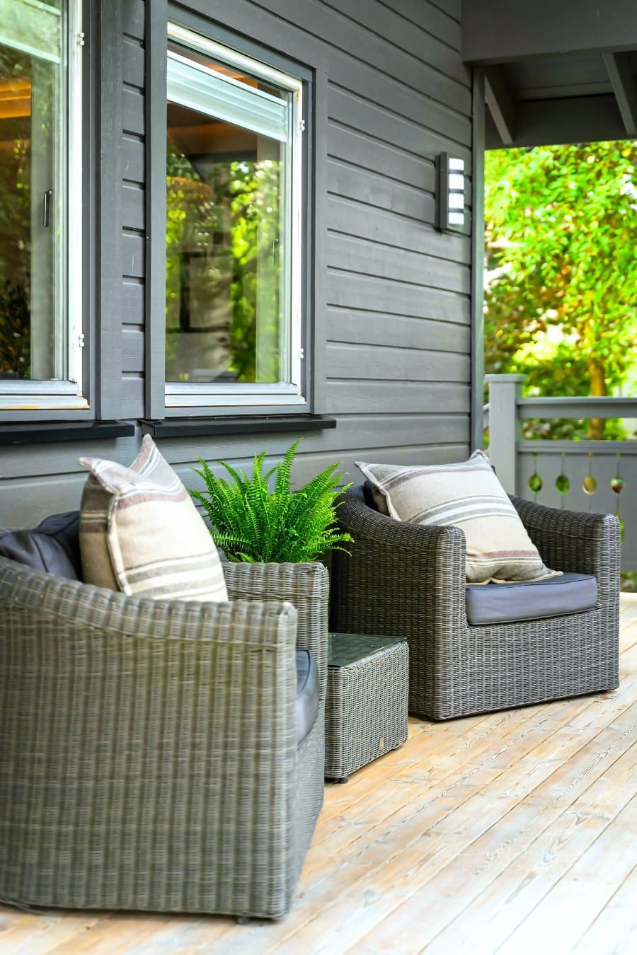 Armchairs with Cushions Standing on a Porch