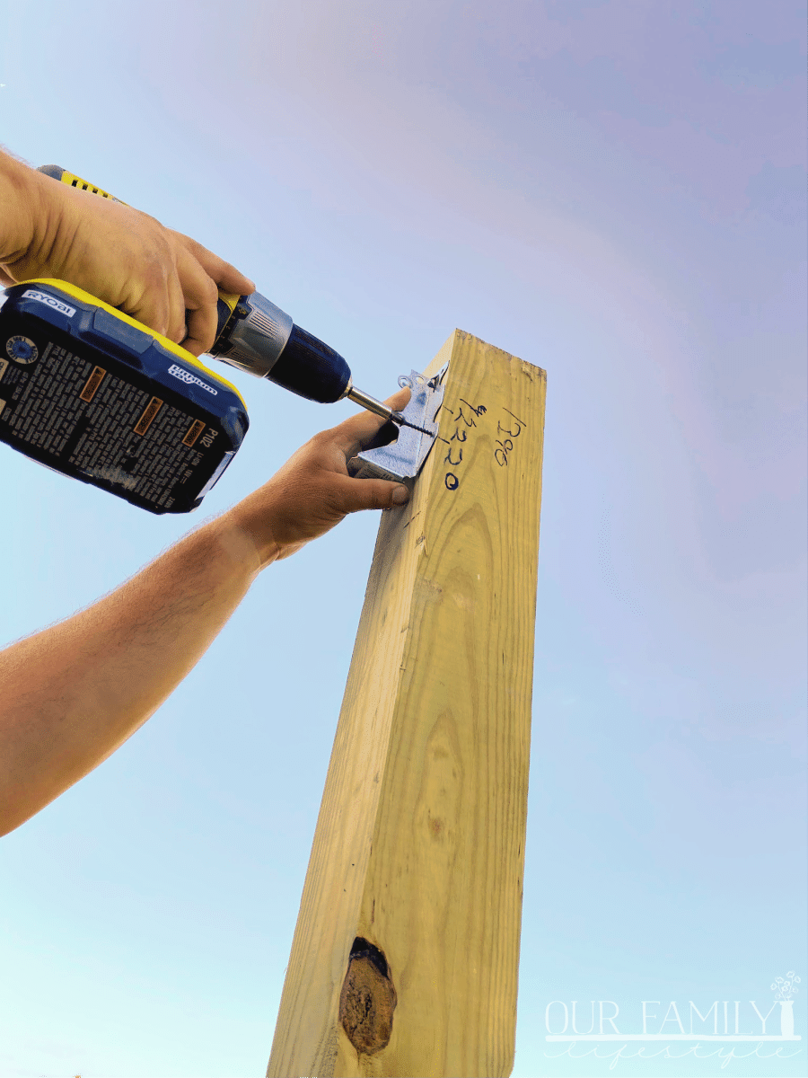 attach joist hanger to 4x4