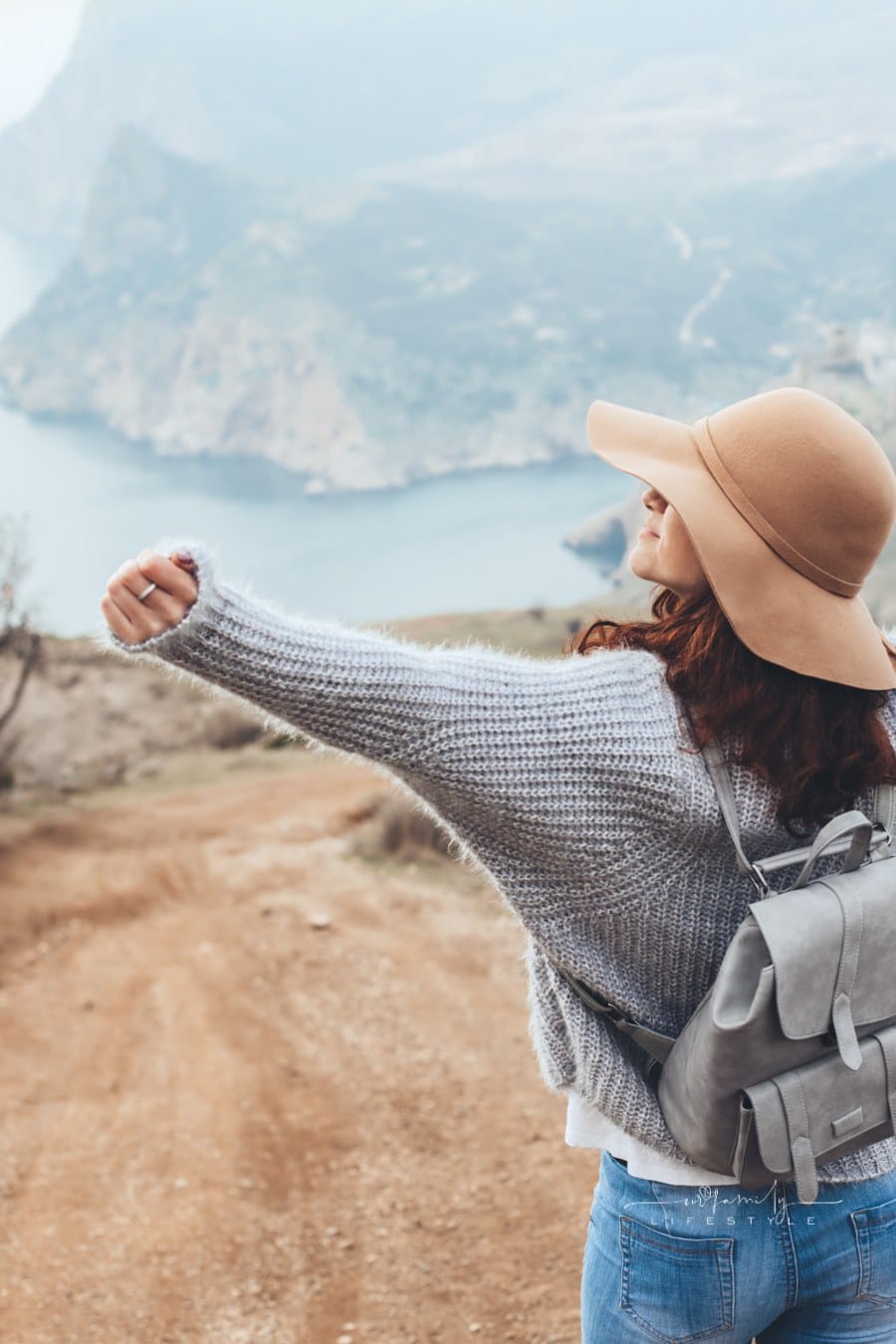 Female Traveling in Mountains