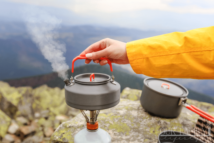 camping teapot with mountain view