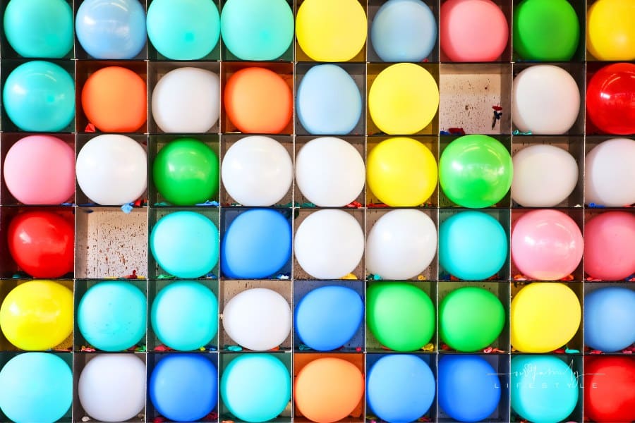 Wall of Balloons with Some Popped, baloon dart Carnival Game