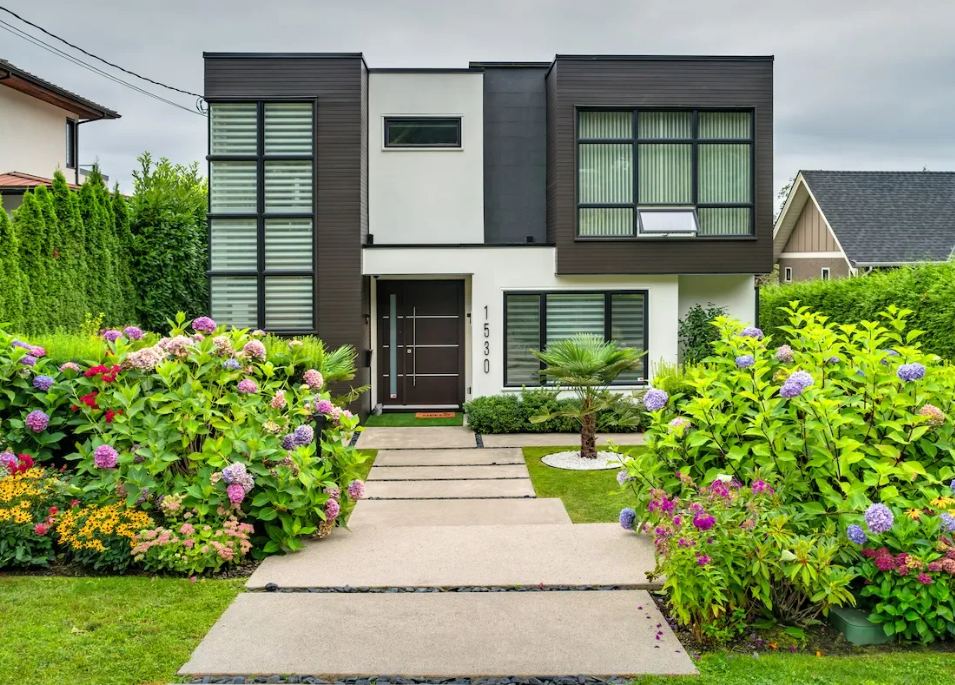 modern style house with luush greenery 