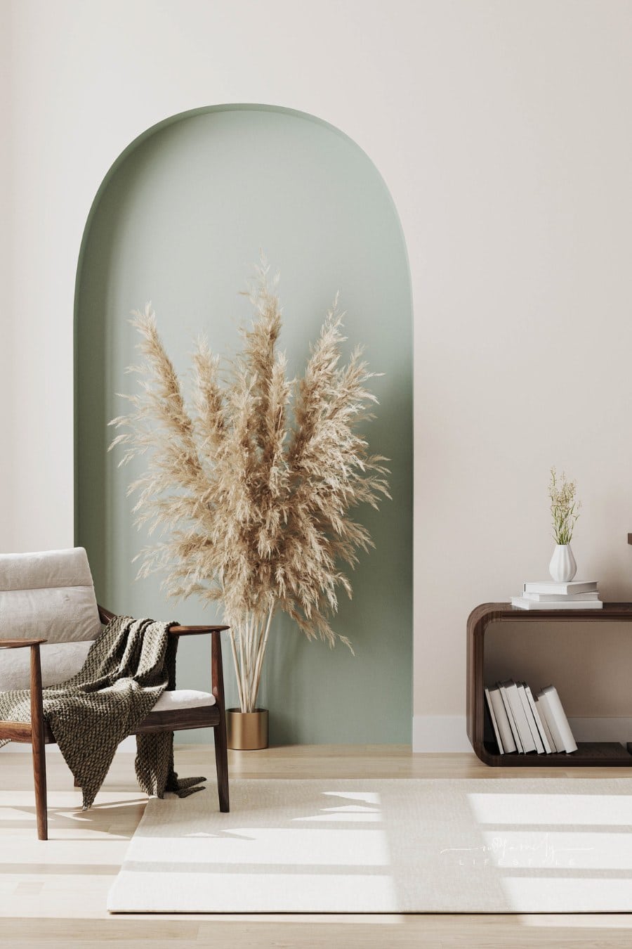 Modern interior design of living room with white wooden chair with blanket, pampass grass, decorative pastel green arch and white column