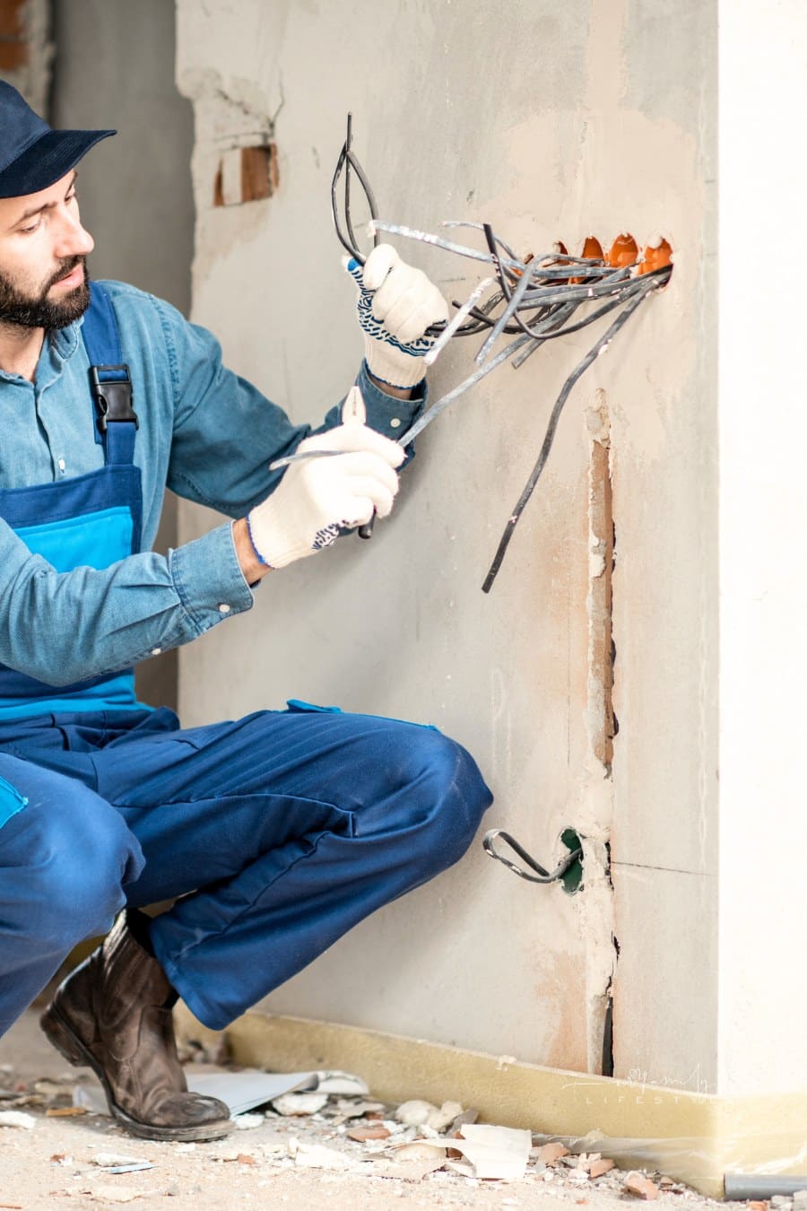 Electrician Mounting Wiring Indoors for electric sockets