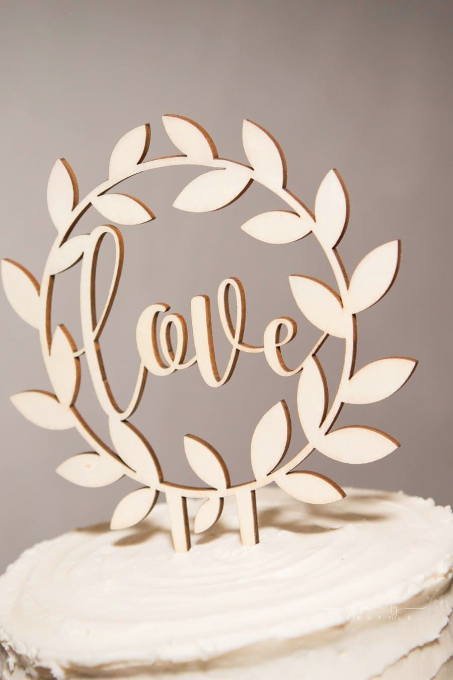 Laser cut wooden “Love” cake topper