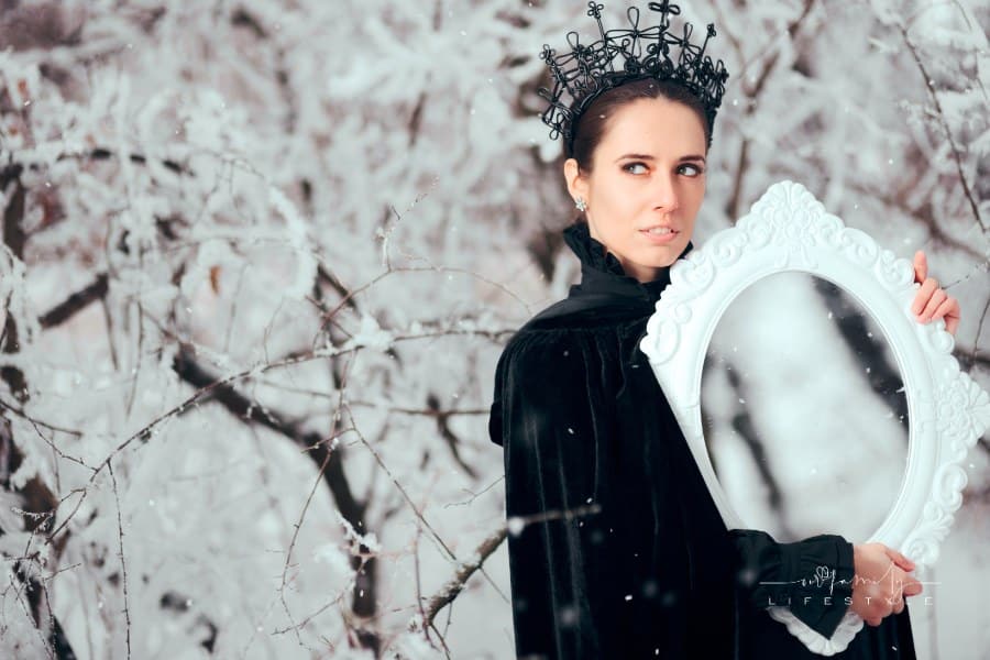 Evil Queen with Magic Mirror in Winter Wonderland