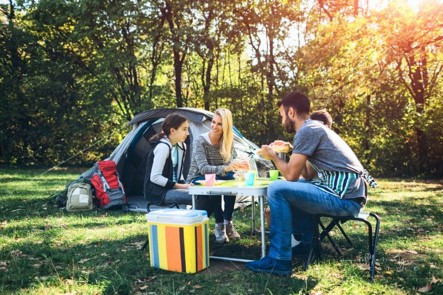 Family tent camping together